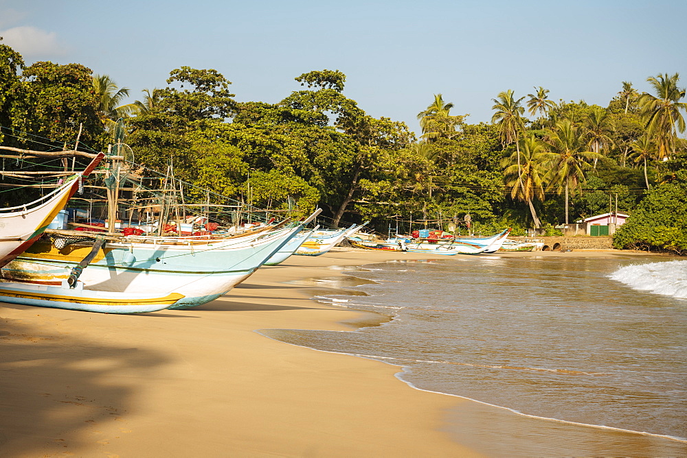 Fishing boats on Devinuwara Beach, Dondra, South Coast, Sri Lanka, Asia