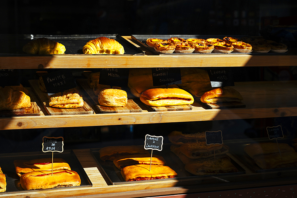 Food on display at bakery, Porto, Porto District, Portugal, Europe