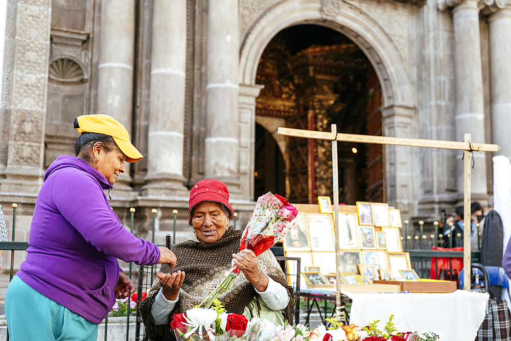 Flower vendor outside church, Quito, Ecuador