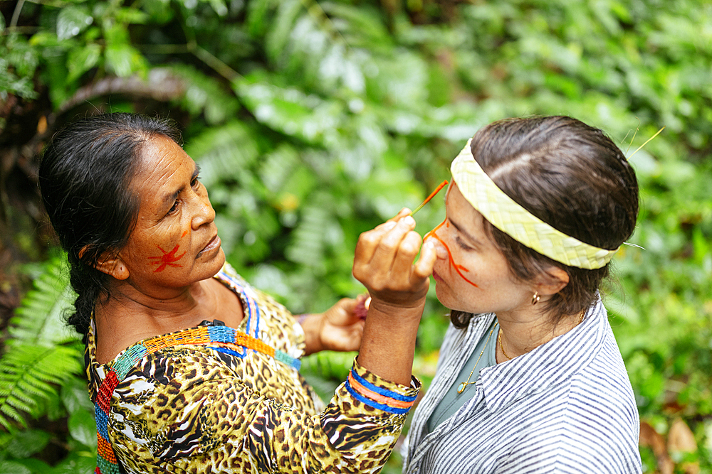 Face painting ritual, Sinchi Warmi, Amazonia, Napo Province, Ecuador