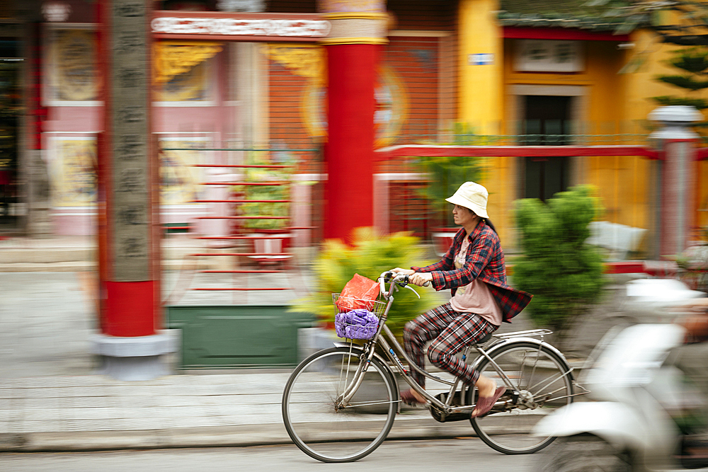 Woman on bicycle, Hoi An, Quảng Nam Province, Vietnam