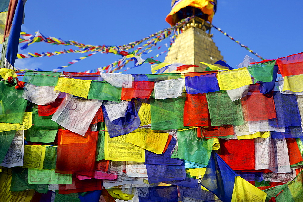 Prayer flags in front of Boudha (Bodhnath) (Boudhanath) Tibetan stupa in Kathmandu, UNESCO World Heritage Site, Nepal, Asia