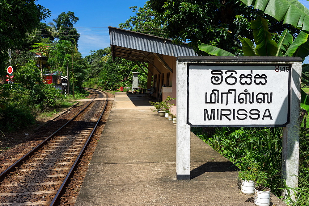 Platform sign and tracks at Mirissa train station in the south of Sri Lanka, Asia