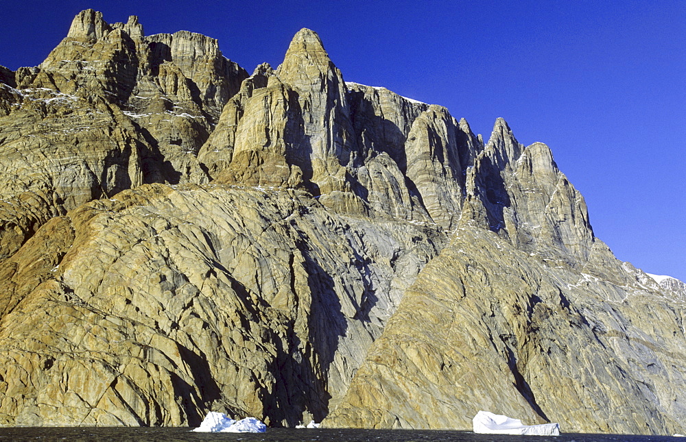 Rockwalls in ?-Fjord. Scoresbysund, East Greenland