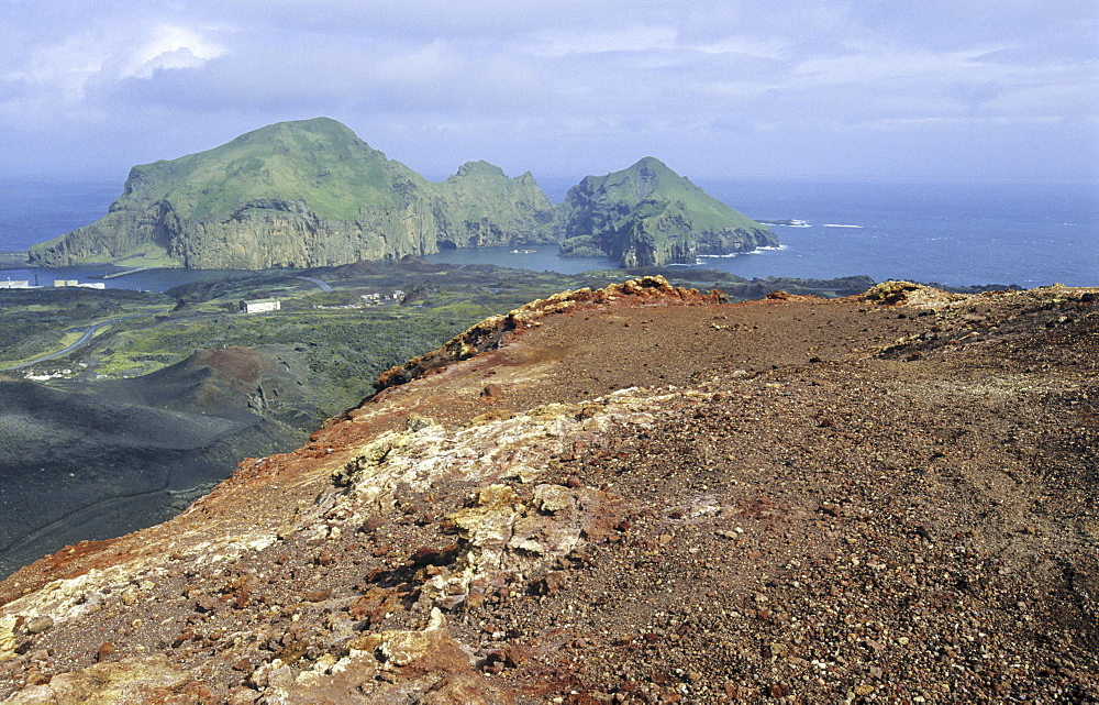 View from the Volcano Eldfell down to the settlement Heimaey. Vestmannaeyjar Islands, Southern Iceland