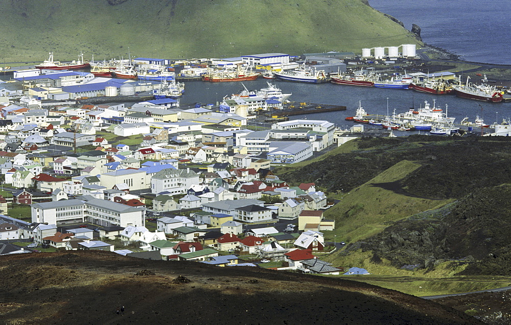 View from the Volcano Eldfell down to the settlement Heimaey. Vestmannaeyjar Islands, Southern Iceland