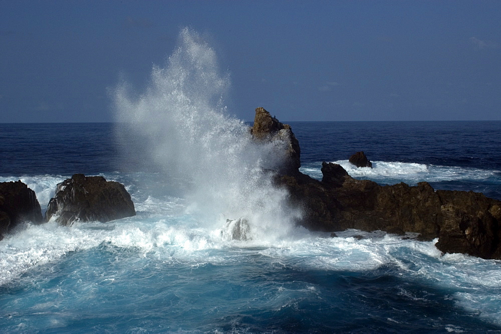 Waves crashing over St. Peter and St. Paul's rocks, Brazil, South America