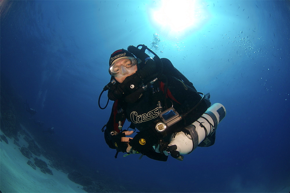 Mixed gas rebreather diver showing equipment.  Red Sea.