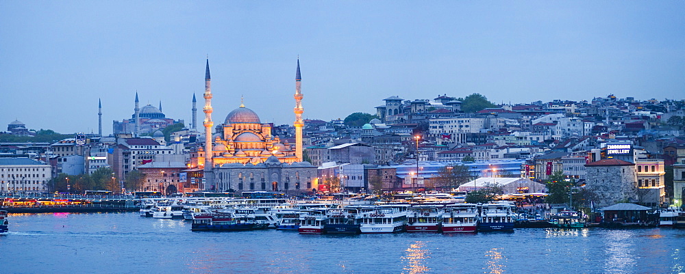 New Mosque (Yeni Cami) on the banks of the Golden Horn at night with Hagia Sophia (Aya Sofya) behind, Istanbul, Turkey, Europe