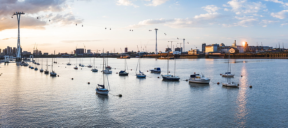 River Thames at sunset and the Emirates Air Line Cable Car, East London, England, United Kingdom, Europe