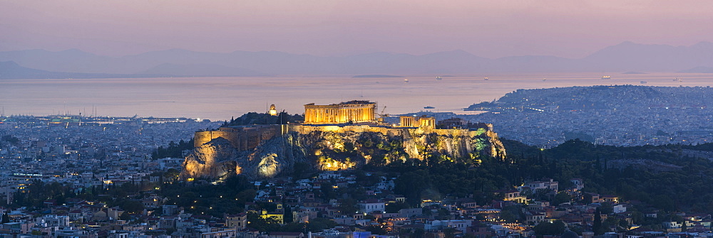 View over Athens and The Acropolis, UNESCO World Heritage Site, at sunset from Likavitos Hill, Athens, Attica Region, Greece, Europe