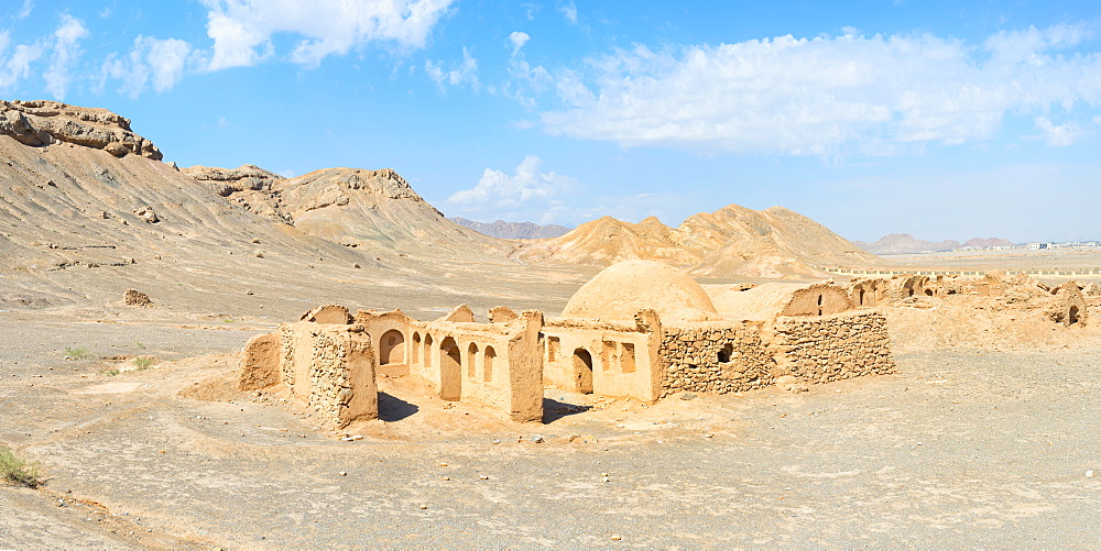 Ruins of ritual buildings in front of Dakhmeh Zoroastrian Tower of Silence, Yazd, Iran, Middle East