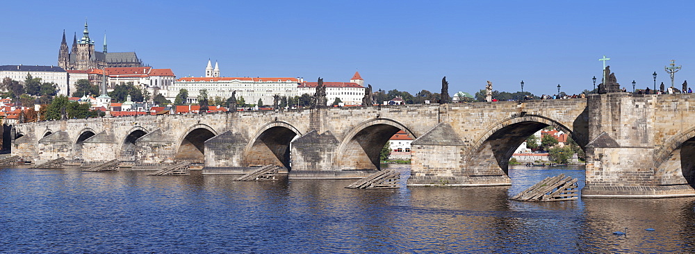 Panoramic  view of River Vltava with Charles Bridge and the Castle District with St. Vitus Cathedral and Royal Palace, UNESCO World Heritage Site, Prague, Czech Republic, Europe