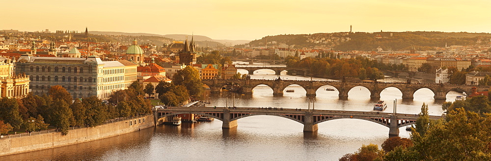 Bridges over the Vltava River including Charles Bridge, UNESCO World Heritage Site, and the Old Town Bridge Tower at sunset, Prague, Bohemia, Czech Republic, Europe 