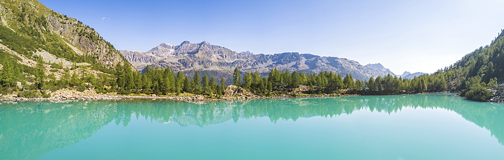 Panoramic of turquoise Lago Lagazzuolo, Chiesa In Valmalenco, Province of Sondrio, Valtellina, Lombardy, Italy, Europe (Drone)