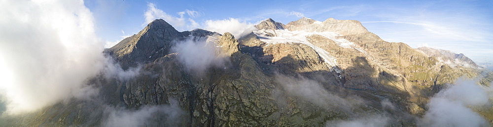 Panoramic of Piz Arlas, Cambrena, Caral at dawn Bernina Pass, Poschiavo Valley, Engadine, Canton of Graubunden, Switzerland, Europe (Drone)