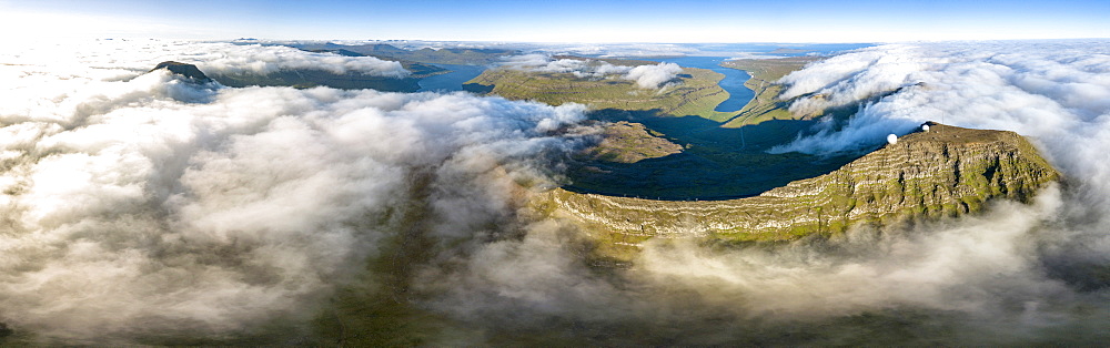 Aerial panoramic of Skaelingsfjall mountain and radar station on Sornfelli peak, Streymoy island, Faroe Islands, Denmark, Europe