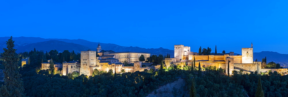 Panorama of Alhambra palace at sunset in Granada, Spain, Europe