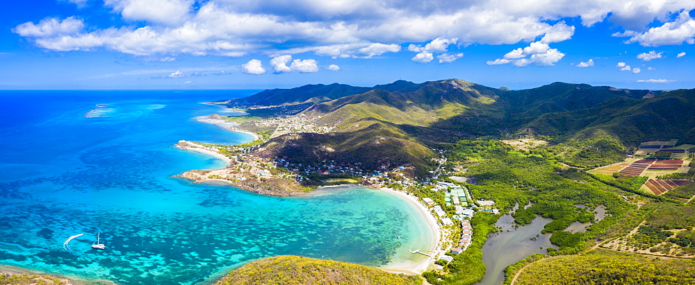 Aerial panoramic by drone of Carlisle Bay Beach and Old Road Village, Antigua, Antigua and Barbuda, Leeward Islands, West Indies, Caribbean, Central America