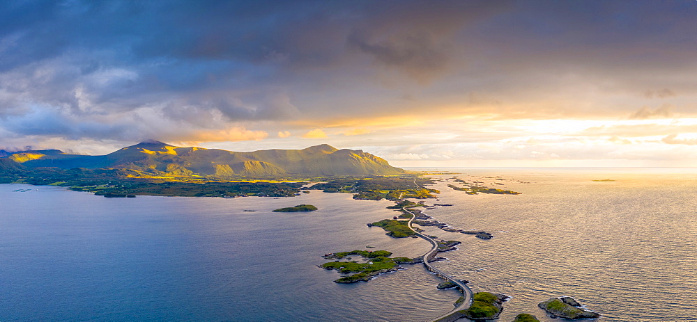 Aerial panoramic of Storseisundet Bridge at sunset, Atlantic Road, More og Romsdal county, Norway, Scandinavia, Europe