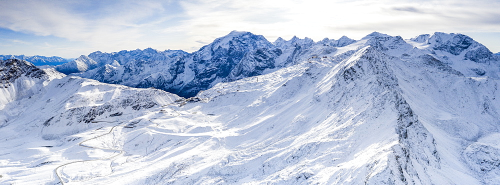 Aerial view by drone of Stelvio Pass road and snowy Ortles mountain, Sondrio province, Valtellina, Lombardy, Italy, Europe