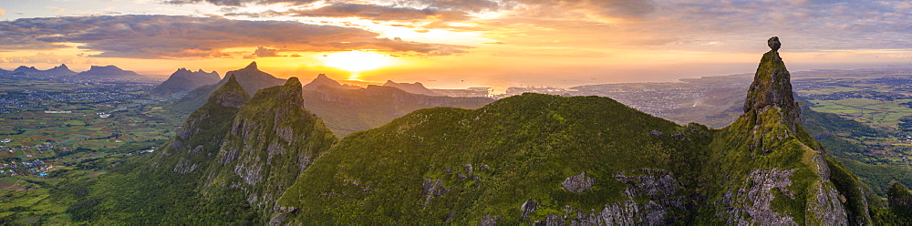 Aerial panoramic of sunset over Le Pouce and Pieter Both mountains, Moka Range, Port Louis, Mauritius, Africa