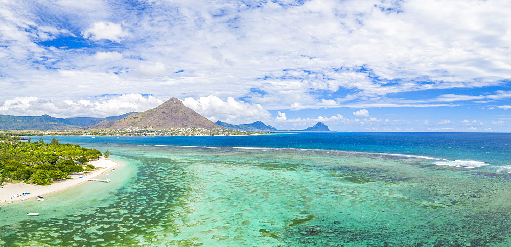 Aerial panoramic by drone of Flic en Flac beach with Tamaris village and Le Morne mountain, Black River, Mauritius, Indian Ocean, Africa