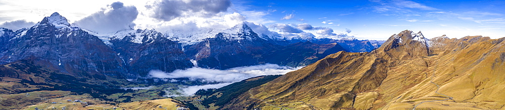 Aerial panoramic of Eiger and Schreckhorn in autumn from First and Grindelwald, Bernese Alps, Canton of Bern, Switzerland, Europe