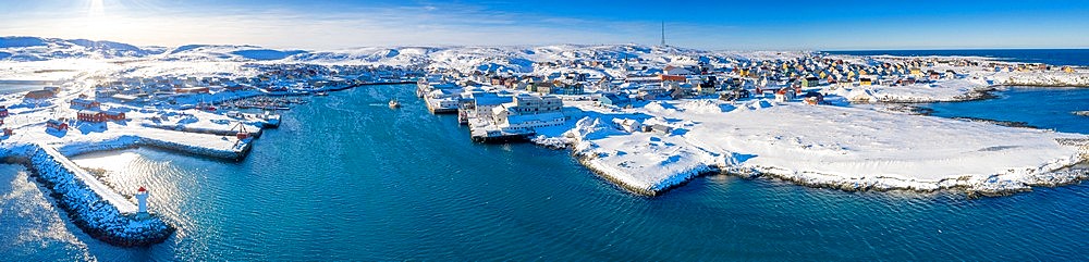 Aerial panoramic of Berlevag village covered with snow and cold Arctic sea, Varanger Peninsula, Troms og Finnmark, Norway, Scandinavia, Europe