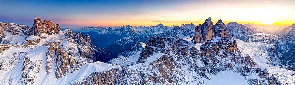 Sunset on the snow capped Tre Cime Di Lavaredo, Monte Paterno and Croda Dei Toni, Sesto Dolomites, South Tyrol/Veneto, Italy