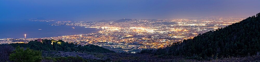 Panoramic of Naples city lights and Gulf at dusk from Vesuvius, Naples, Campania, Italy, Europe