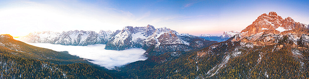 Sunrise over Lake Misurina covered by clouds, Monte Cristallo, Sorapis and Marmarole group, Dolomites, Veneto, Italy, Europe