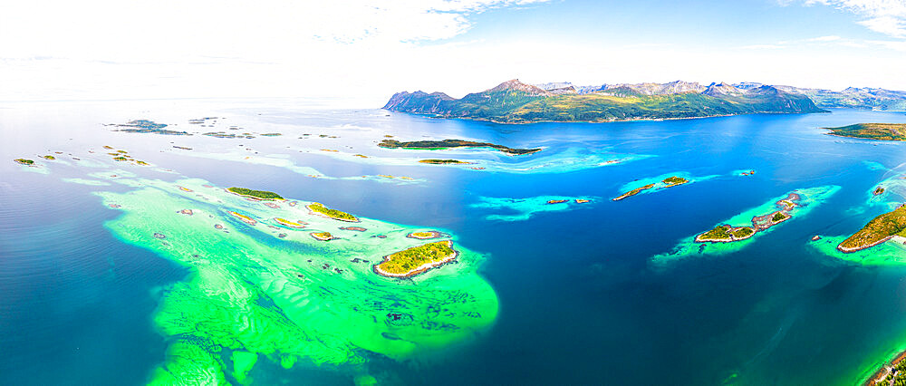 Bergsoyan Islands surrounded by emerald transparent sea in summer, Hamn I Senja, Skaland, Senja, Troms county, Norway, Scandinavia, Europe