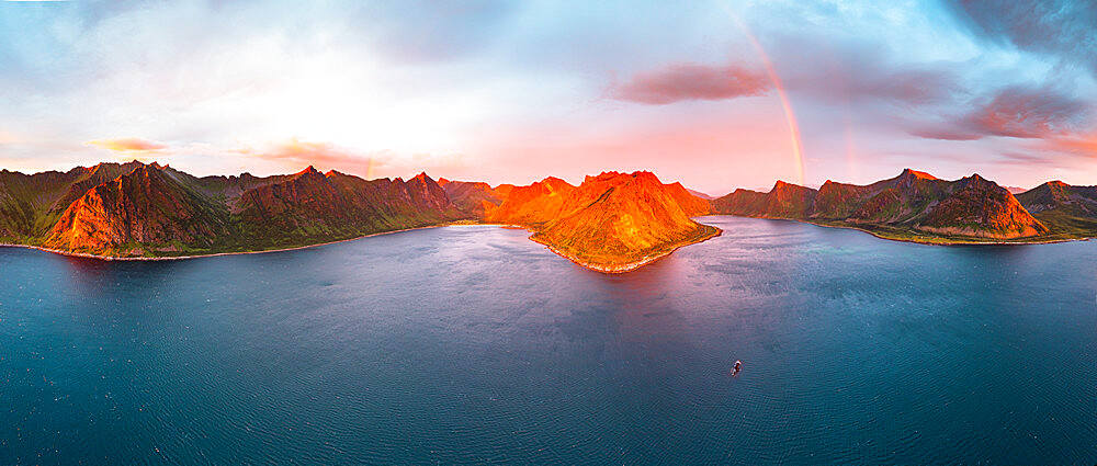 Aerial view of Arctic sea with Ersfjord and Steinfjord fjords under the rainbow at midnight sun, Senja, Troms county, Norway, Scandinavia, Europe