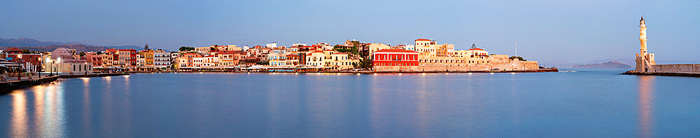 Panoramic of the old Venetian port and lighthouse during the blue hour, Chania, Crete, Greek Islands, Greece, Europe