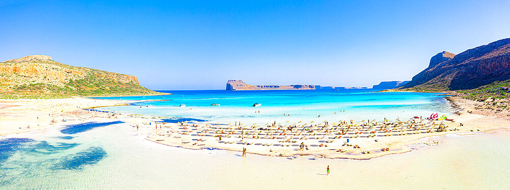 People sunbathing on idyllic white sand beach, Balos, Crete, Greek Islands, Greece, Europe