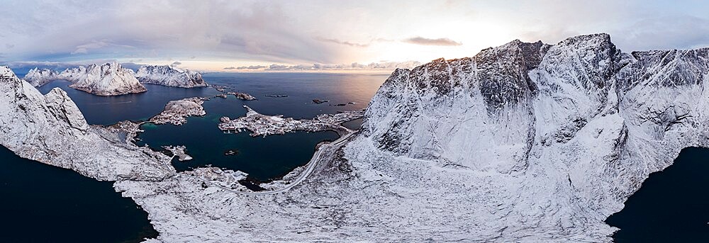 Clouds over Reinevatnet Lake, Reinebringen and Olstind mountain peaks covered with snow, Reine Bay, Lofoten Islands, Norway, Scandinavia, Europe