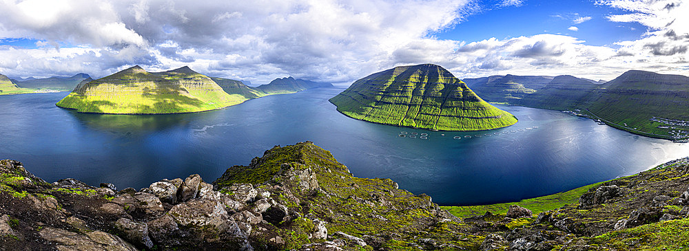 Panoramic view of Kunoy Island ovelooking the ocean from top of Klakkur mountain, Klaksvik, Bordoy Island, Faroe Islands, Denmark, Europe