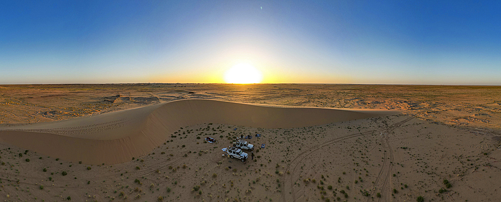 Aerial of sunset over a beautiful sand dune in the Tibesti Mountains, Chad, Africa