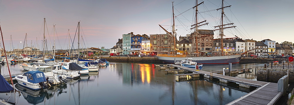 Dusk over Sutton Harbour and the Barbican, the historic and tourist heart of the city of Plymouth, Devon, England, United Kingdom, Europe