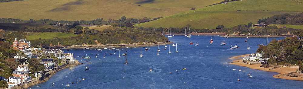 The stunning Kingsbridge estuary, with the village of Salcombe on the left, surrounded by green Devon countryside, Devon, England, United Kingdom, Europe