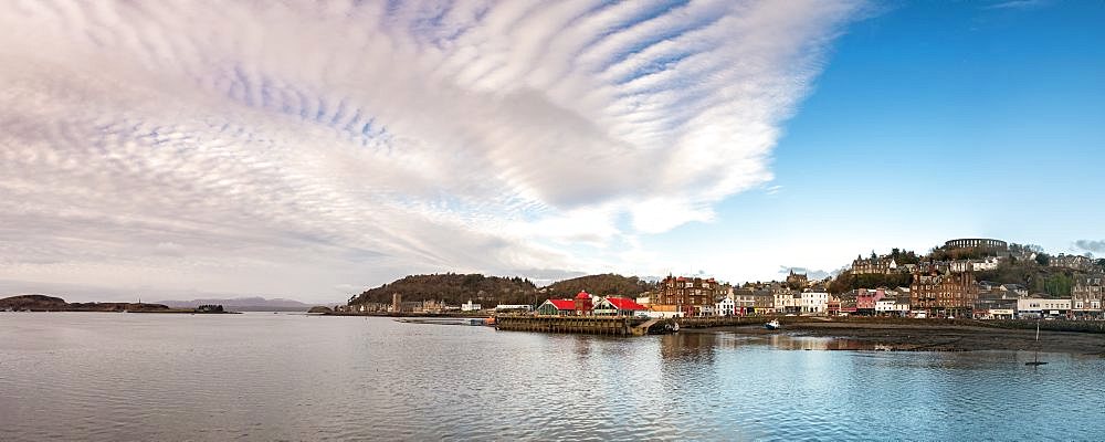 Panorama of Oban, Highlands, Scotland. Looking out into Oban Bay and the Sound of Mull beyond.