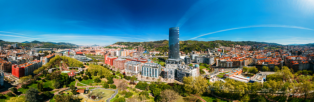 Aerial panoramic view of Bilbao, an industrial port city in northern Spain, is surrounded by green mountains, the de facto capital of Basque Country, Spain, Europe