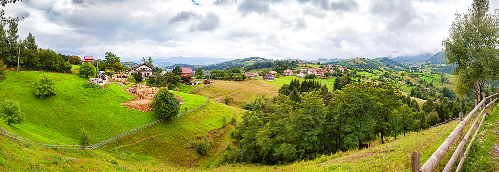 Rural landscape of Magura village, 1000 metres up in the mountains, in the Piatra Craiului National Park, Romania, Europe