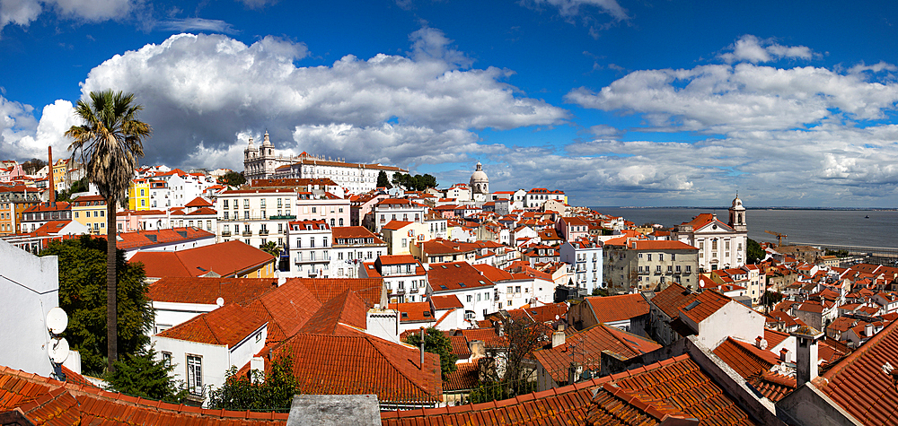 panoramic view of skyline of Lisbon city, Portugal, many colorful houses in the Alfama district