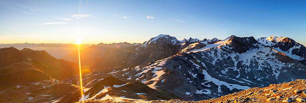 Panoramic view of Stelvio Mountain pass at sunrise, Valtellina, Lombardy, Italy. Europe