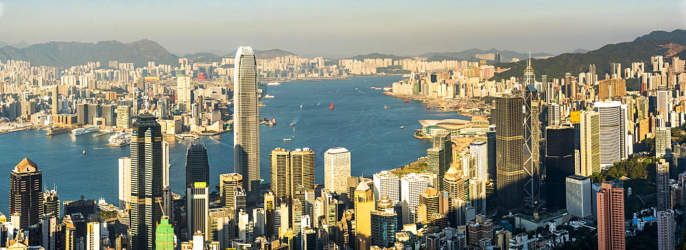 View over Victoria Harbour at sunset, seen from Victoria Peak, Hong Kong Island, Hong Kong, China, Asia