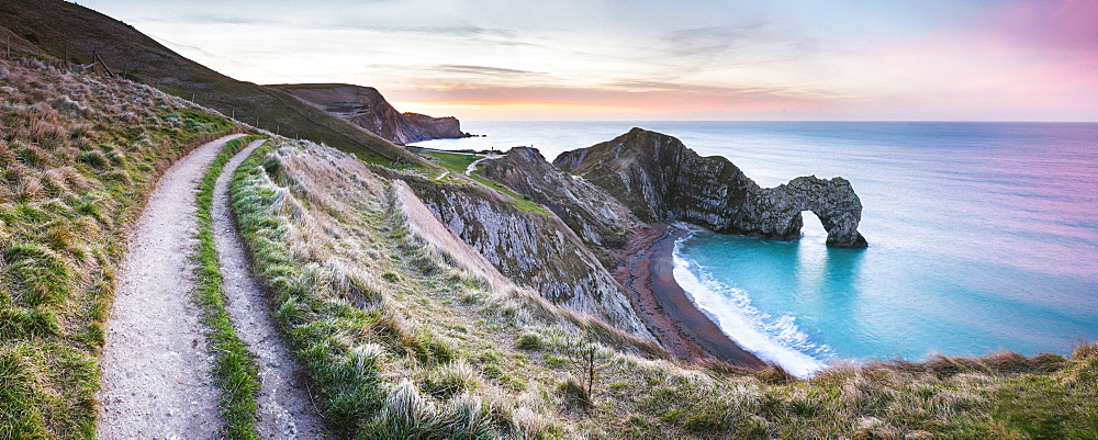 Durdle Door at sunrise, Lulworth Cove, Jurassic Coast, UNESCO World Heritage Site, Dorset, England, United Kingdom, Europe