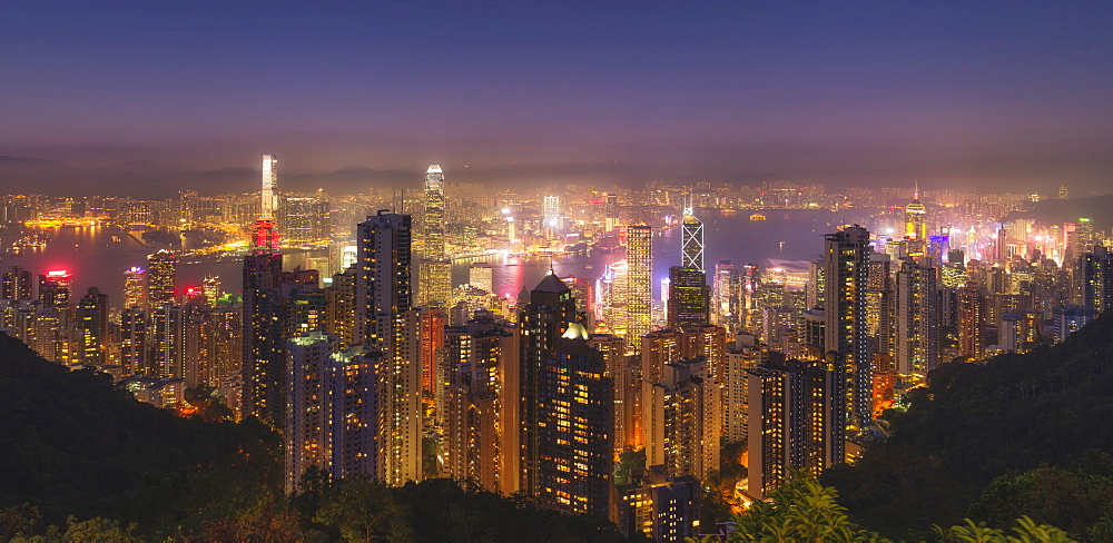 Hong Kong city skyline at night, showing the Central and Kowloon area, viewed from Victoria Peak, Hong Kong, China, Asia