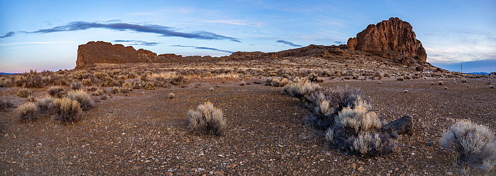 Sagebrush and a large rock formation before sunrise in the desert, Oregon, United States of America, North America